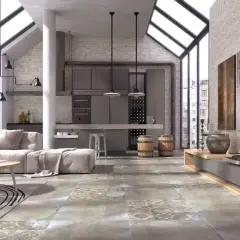 Nowoczesny salon z industrialnymi akcentami. Wzory na płytkach w salonie dodają mu charakteru.