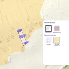 Mapa działki z wymiarami i powierzchnią. Okno "Wybór mapy" pozwala sprawdzić przeznaczenie działki online, wybierając "Geo mapa" lub "Tereny budowlane".